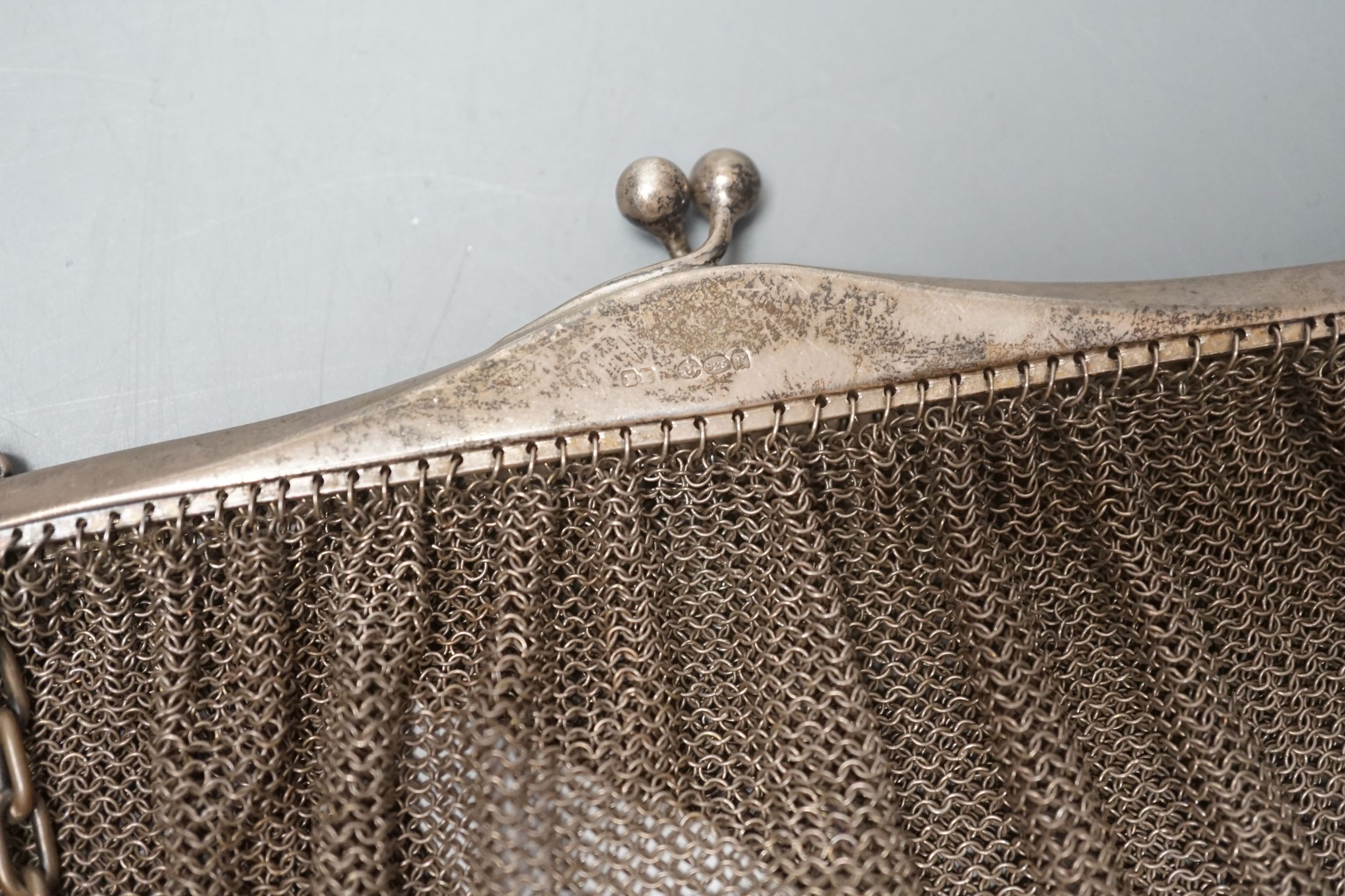 A George V silver mesh evening bag, import marks for London, 1912, 11.5oz.